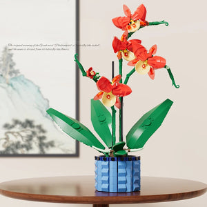 ORANGE ORCHID IN THE PLANT POT | 528 pieces